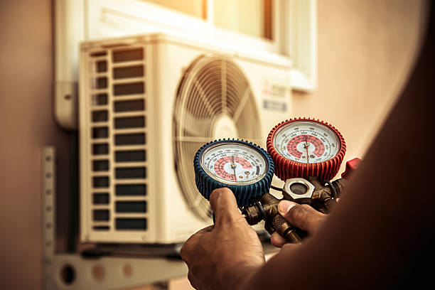Professional Air Conditioning Service technician working in Lake Placid, FL
